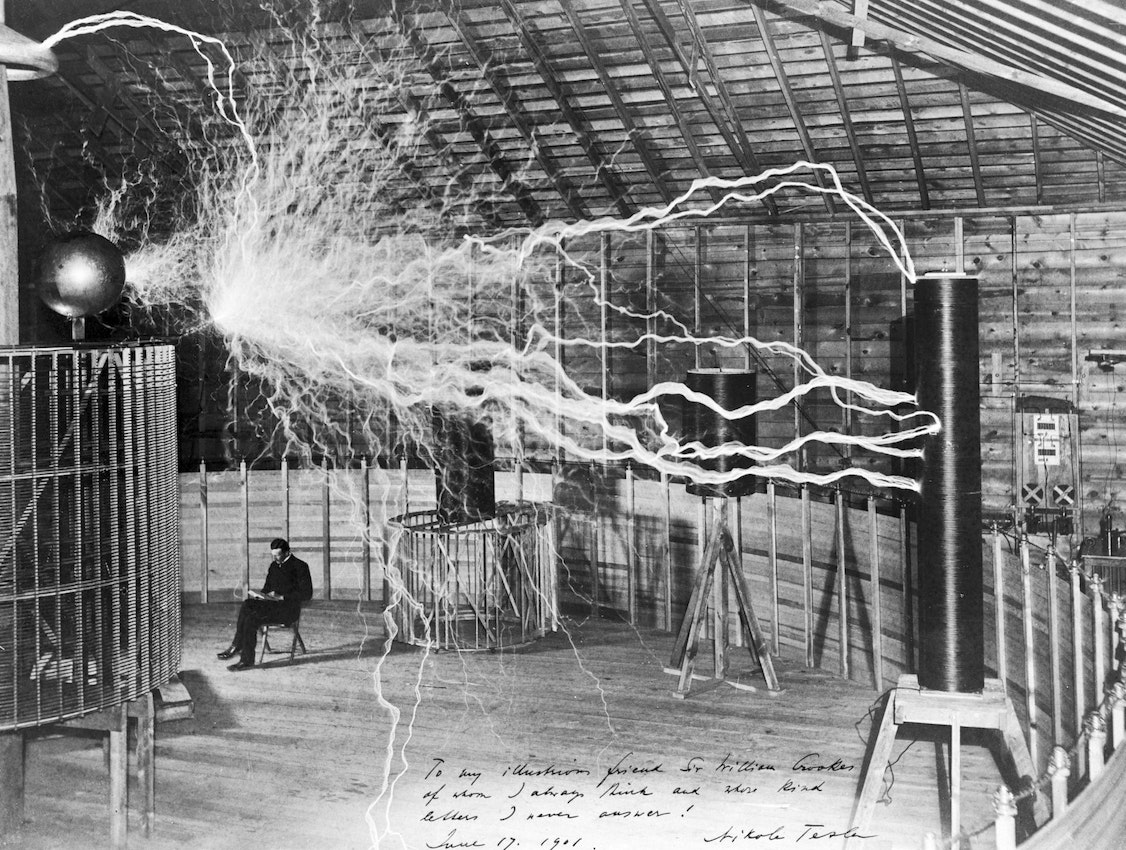 Photograph of Tesla in laboratory
