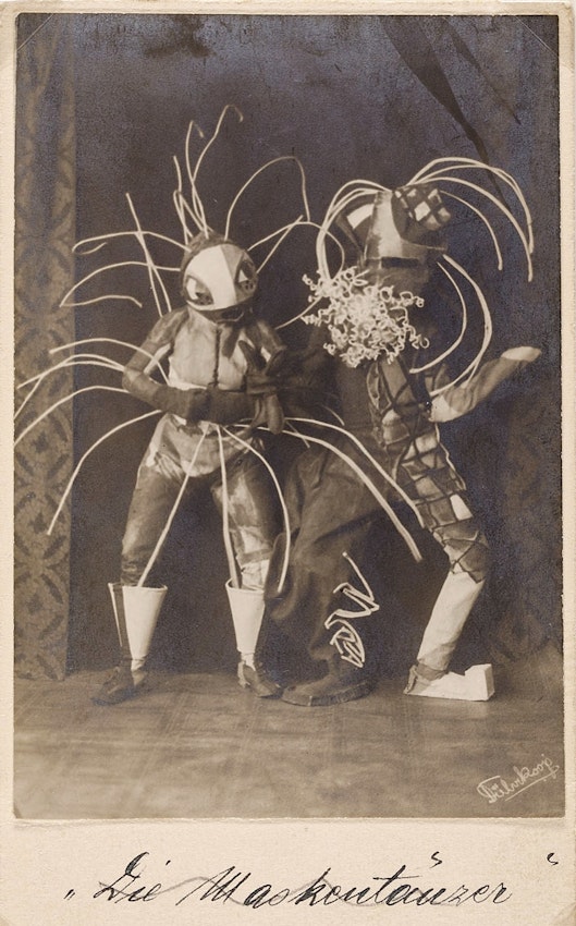 Photograph by Minya Diez-Dührkoop of the mask dancers