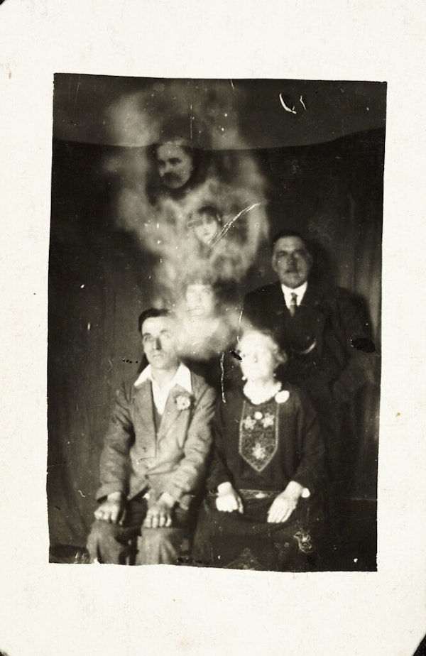 Family group with two spirits