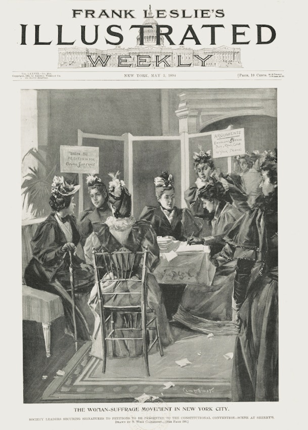 The full cover of the magazine includes title and publication details with full-page illustration showing women seated around a table signing a petition