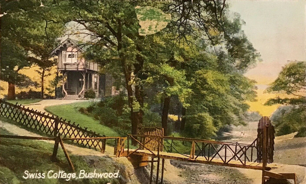 A cottage with bridge in the foreground