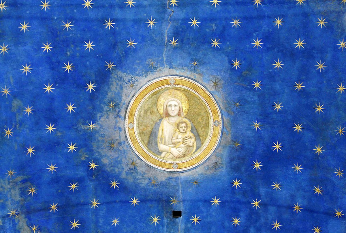 Virgin Mary and stars Arena Chapel in Padua Giotto)
caption={Detail featuring the Virgin Mary, from the ceiling of the Capella degli Scrovegni (Arena Chapel), in Padua, magnificently adorned with Giotto frescoes in ca. 1305. For the luminous blue throughout Giotto made use of ultramarine, which, due to its chemistry and expense, had to be applied on top of the already-dry fresco (*fresco secco*) — <a href="https://commons.wikimedia.org/wiki/File:Virgin_Mary_-_Ceiling_-_Capella_degli_Scrovegni_-_Padua_2016.jpg" rel="noopener noreferrer" target="_blank">Source</a> (Photo: José Luiz Bernardes Ribeiro, [CC BY-SA 4.0](https://creativecommons.org/licenses/by-sa/4.0/))