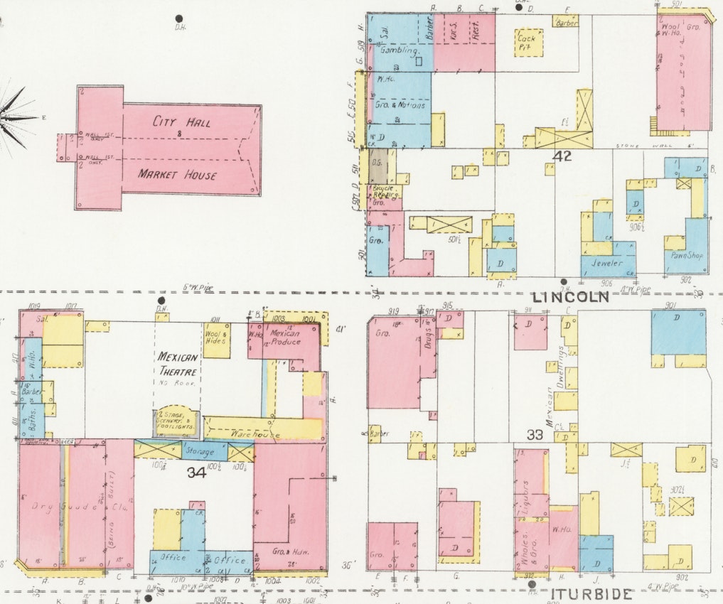 A detailed map highlighting City Hall, Market House, and the Mexican Theatre, with adjacent buildings color-coded and labeled by their functions, including groceries and offices