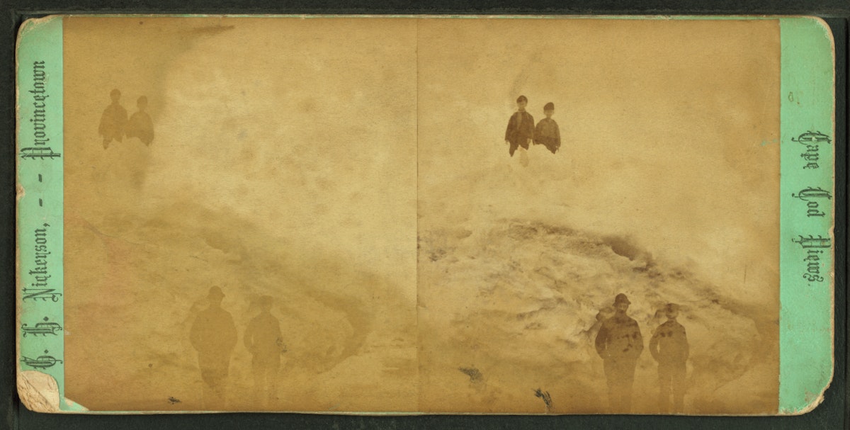 A stereo image of two people in the foreground and two in the background partially obscured by ice