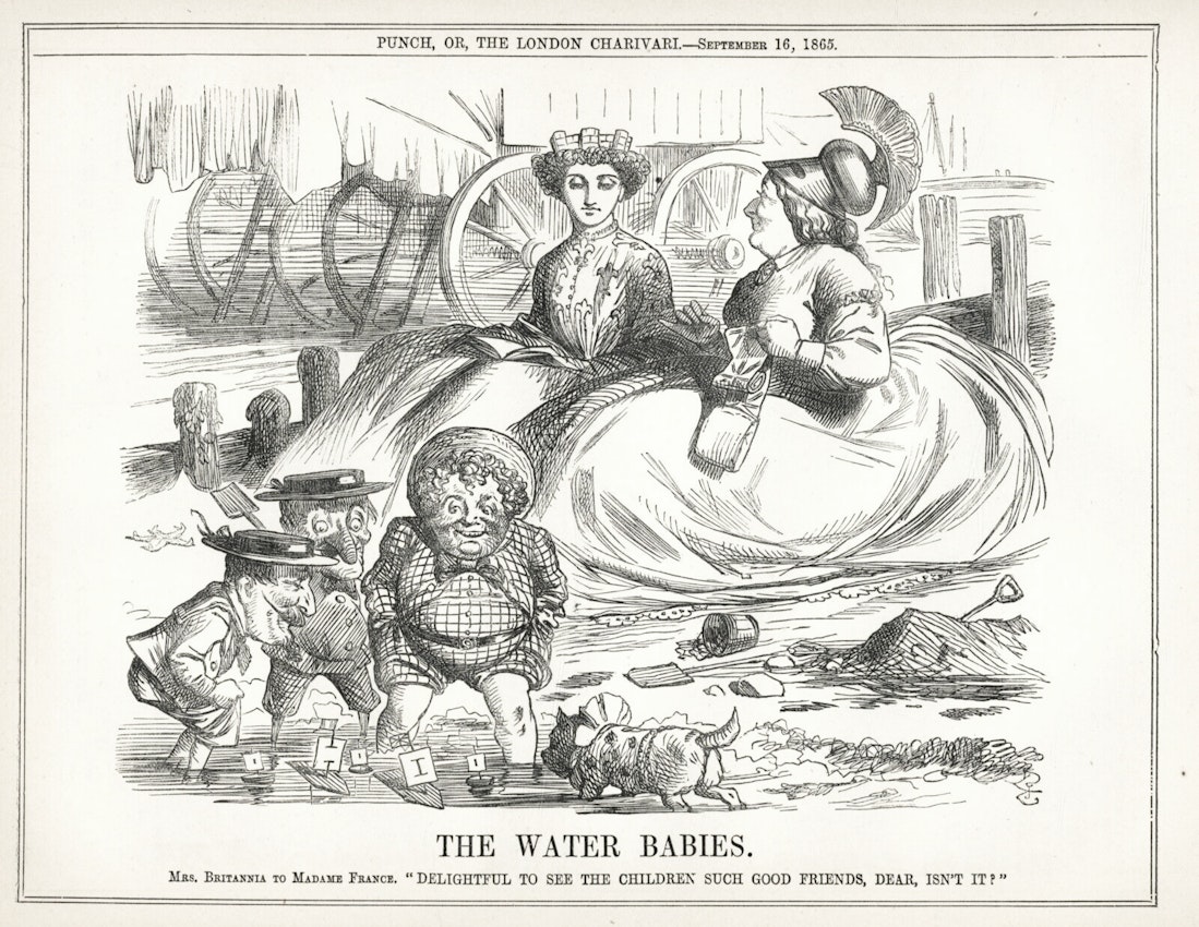 A cartoon shows two elegantly dressed women, labeled Mrs. Britannia and Madame France, observing three caricatured, childlike figures representing countries, playing with blocks by the water